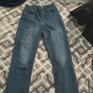 New jeans. Mom style . Size 24. 98% cotton, 2% spandex elastane